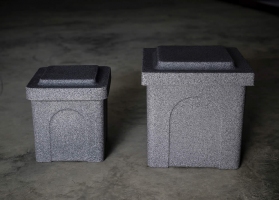Poly Urn Vaults are available in two sizes and two colours. Shown here are both sizes:  small 10 x 10 x 12" and large 13 x 13 x 15", both in grey granite.