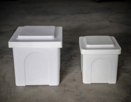 Poly Urn Vaults are available in two sizes and two colours. Shown here are both sizes:  small 10 x 10 x 12" and large 13 x 13 x 15", both in white.